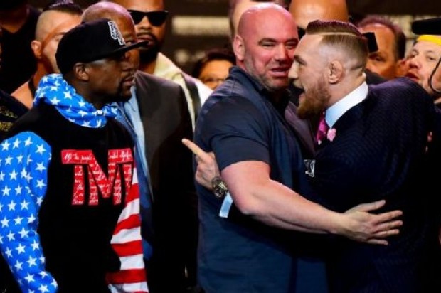 Burlas y amenazas en primer cara a cara entre Mayweather y McGregor